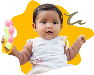 Infant wearing white shirt with arms to the side