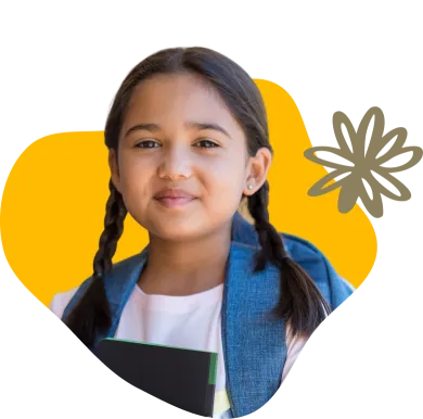 Young girl smiling wearing a white shirt and blue jacket